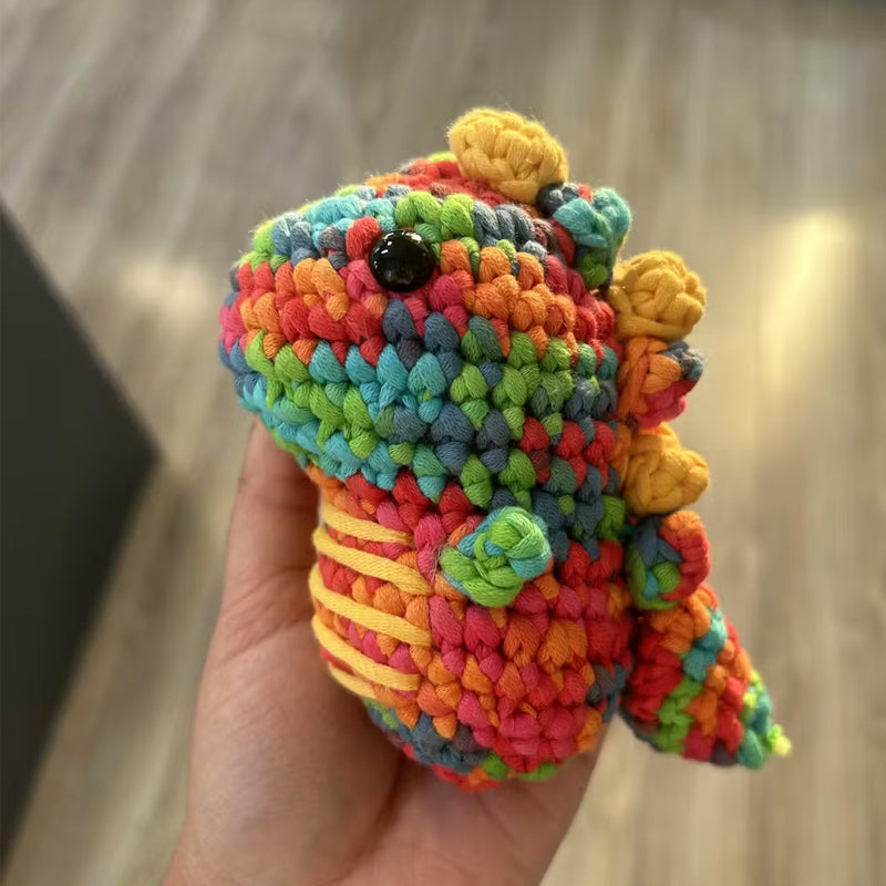 Colorful crocheted dinosaurs